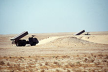 A Brazilian-made Avibras ASTROS-II SS-30 multiple rocket systems on Tectran 6x6 AV-LMU trucks stand in firing position while being displayed as part of a demonstration of Saudi Arabian equipment. DF-ST-92-07428.JPEG