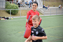 Scalia teaching rugby techniques to a youth football group (2019) Daniela Scalia coaching with rugby techniques FC Lugano Settore Giovanile.png