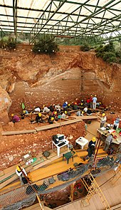 Excavations at the site of Gran Dolina, in the Atapuerca Mountains, Spain, 2008 Dolina-Pano-3.jpg