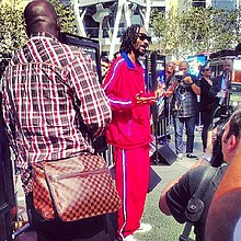 Snoop Dogg, who voices Smoove Move in the film, debuted "Let the Bass Go", a song he created for the film's soundtrack, at the E3 convention. DreamWorks Turbo, Snoop Dogg at E3 2013.jpg