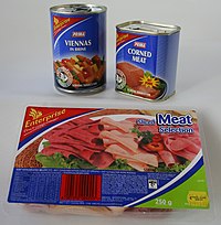 A selection of three Enterprise products. Sliced meats, canned viennas, and a can of corned meat. Enerprise corned meats.jpg
