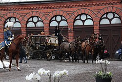 The State Coach at the Royal Stables.