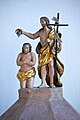 English: BSculpture of the baptism of Jesus Christ on top of the baptismal font Deutsch: Figur der Taufe Jesu Christi auf dem Deckel des Taufsteins