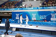 Deutsch: Fechten bei den Olympischen Jugend-Sommerspielen 2018: Tag 1, 7. Oktober 2018, Jungen, Säbel, Finale - Krisztián Rabb (HUN) - Hyun Jun (KOR) (USA) 15:13 English: Fencing at the 2018 Summer Youth Olympics at 7 October 2018 – Boys' sabre Gold medal match – Krisztián Rabb (HUN) Vs Hyun Jun (KOR) (USA) 15:13