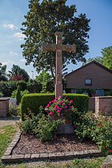 Cemetery cross, war memorial and tombs