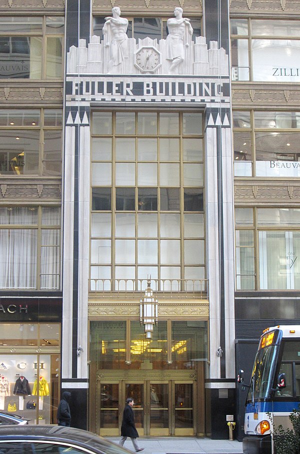 The three-story entrance on 57th Street with architectural sculptures by Elie Nadelman at the top