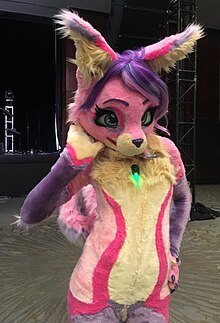 An example of a fursuiter at a local convention, dressed as a pink squirrel. Furnal Equinox IMG 1463.jpg