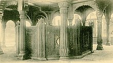 Rear-view of the well as depicted in a British India postcard c. 1900. The hexagonal screen had been installed by the local municipality to prevent devotees from dying of ritualistic suicide. Gyan Vapi Well Rear View.jpg