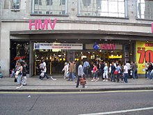 Logo (in blue circle) at HMV's former flagship store, Oxford Street, London HMV - Oxford Street 1.jpg