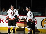 The Hitmen accept the Scotty Munro Memorial Trophy