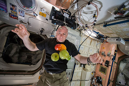 ISS-44 Scott Kelly enjoying some fresh fruit and vegetables