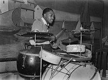 A drum kit Jazz drummer.jpg