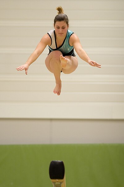 File:Jump on balance beam.jpg