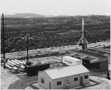 One CIM-10 Bomarc. Launch pad with rocket on board ready for firing in close proximity to trailer marked NMC Target Department - NARA - 295617.tif