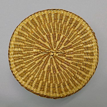 Lid of a hand-woven basket