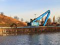 Motorschip en materieel van Waterwerken Nederland BV.