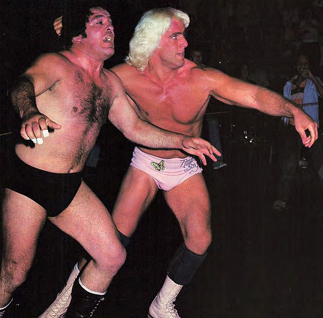 Flair (right) and Paul Jones during a match in Charlotte, North Carolina in 1979