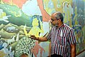 P. K. Sadanandan working on his mural