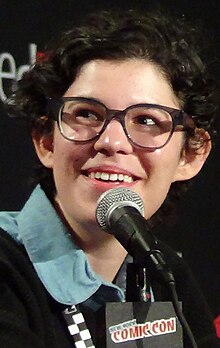 Rebecca Sugar in 2014; she would first work on Adventure Time and would later create her own show, Steven Universe Rebecca Sugar Speaking at New York Comic Con 2014 - Peter Dzubay (cropped).jpeg