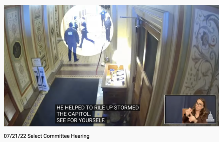 Captured still from a video of Hawley later running from a mob on January 6, shown during the Select Committee meeting of July 21, 2022, and within many Internet memes