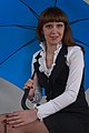 * Nomination Russia. Young woman with umbrella, studio portrait. --Knopik-som 01:38, 7 July 2021 (UTC) * Promotion  Support Good quality -- Johann Jaritz 02:46, 7 July 2021 (UTC)
