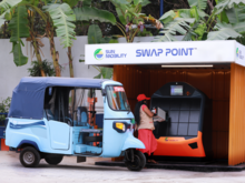 A lady swapping passenger auto-rickshaw batteries at a SUN Mobility Swap Point SUN Mobility Swap Point.png