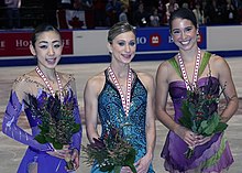 Suguri (left) with the other medalists at 2008 Skate Canada.
