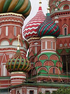 An onion dome is a dome whose shape resembles an onion and is usually associated with Russian architectural style. Such domes are often larger in diameter than the tholobate upon which they sit, and their height usually exceeds their width. These bulbous structures taper smoothly to a point.