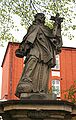 Figura św. Jana Nepomucena za bramą wjazdową