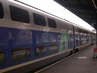 A double-decker TGV leaving Paris (Gare de Lyon station).