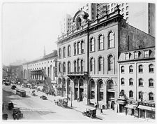 Tammany Hall on East 14th Street between Third Avenue and Irving Place in Manhattan, New York City (1914). The building was demolished c. 1927. Tammany Hall LC-USZ62-101734.jpg