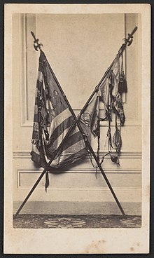Tattered flags of the 19th Massachusetts Infantry Regiment. From the Liljenquist Family Collection of Civil War Photographs, Prints and Photographs Division, Library of Congress Tattered flags of the 19th Massachusetts Infantry Regiment after a battle) - Photographed by John P. Soule, 199 Washn. St., Boston LCCN2016646116.jpg
