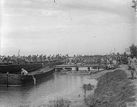 Italian marines of the San Marco Brigade land from barges to take up battle positions on the Piave River in northern Italy. The Battle of the Piave River, June 1918 Q19081.jpg
