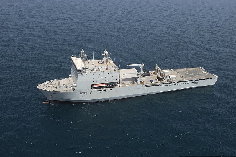 File:The British Royal Fleet Auxiliary landing dock ship RFA Cardigan Bay (L3009) maneuvers into position to receive a U.S. Navy MH-60S Knighthawk helicopter assigned to Helicopter Sea Combat Squadron (HSC) 26 in 130520-N-OA702-044.jpg