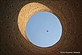 View of the sky from inside the building