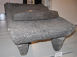 A native American grinder stone tool or 'metate' from Central Mexico. Tool (metate)-UBC 2010.jpg