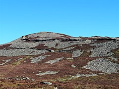 Tre'r Ceir (best preserved hillfort in Europe, built 200 BC) from Garn Ganol; April 2022 27.jpg
