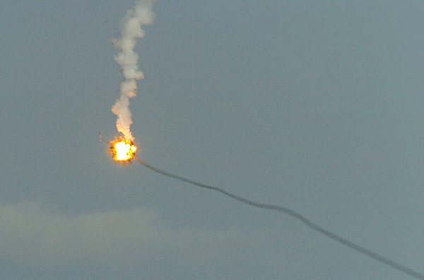 An infrared guided AIM-9M Sidewinder missile hitting a flare