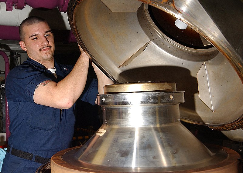 File:US Navy 050303-N-2198V-006 Damage Controlman 3rd Class Jayme Carr of Pace, Fla., removes a tank cover and prepares to takes a fuel sample from the JP5 aviation fuel service tanks.jpg