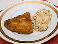 Čeština: Smažený kapr s bramborovým salátem, tradiční české Vánoce English: Christmas carp with potato salad, tradicional Czech christmas