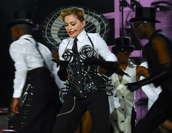 For "Vogue", Madonna donned a re-worked version of the Jean Paul Gaultier-designed conical corset.