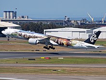 Boeing 777-300ER ZK-OKP with "The Airline of Middle-earth" livery at Brisbane Airport ZK-OKP - 777-319 ER - Air New Zealand - Hobbit - BNE (9634217765).jpg