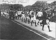 Third Lanark (in dark jerseys) entering the field along with Argentine "Zona Norte" to play a friendly match, June 1923 Zona norte v third lanark 1923.jpg