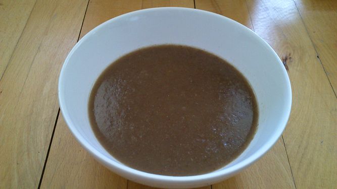 A freshly cooked bowl of Øllebrød. Øllebrød is a traditional Danish breakfast and consists primarily of sweetened cooked rye-bread (from sourdough). There is a whole category on Øllebrød with more information.