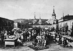 The Square of Contracts in Podil with the belltowers of the Ascension Convent in the background.