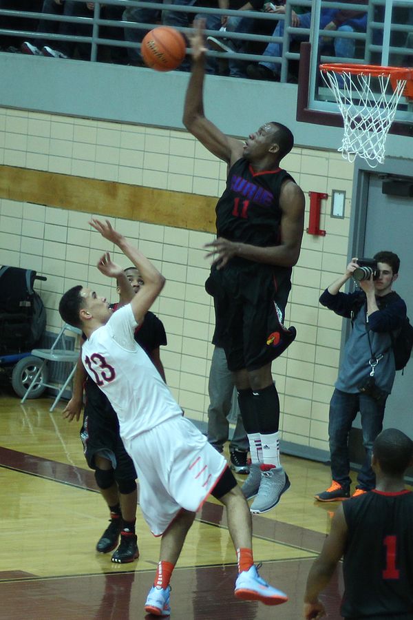 Cliff Alexander blocks a shot during the 2013 IHSA playoffs.