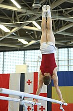 Thumbnail for File:2022-06-25 Budapest Cup Age-group I all-around competition warm-up Parallel bars (Martin Rulsch) 05.jpg