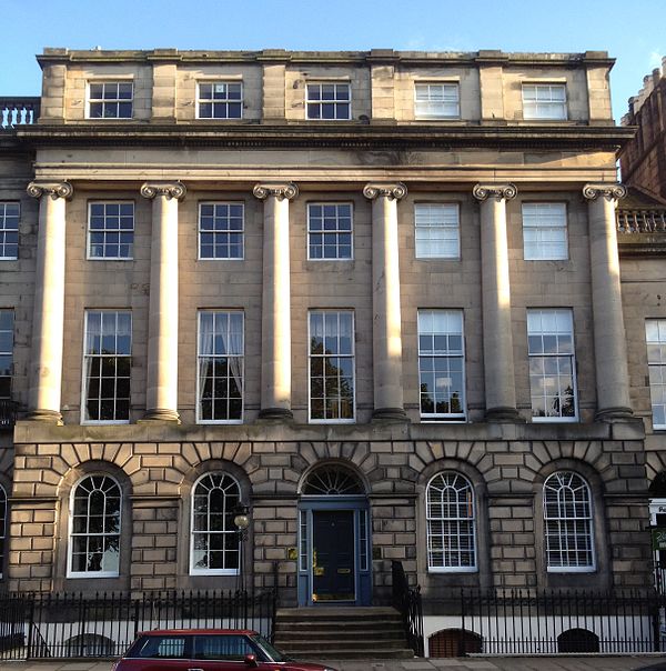 A section of Royal Terrace at the west end of the street, with six Ionic columns. This contains two townhouses: number 4 with the central entrance and