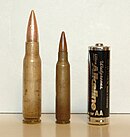 The 7.62x51mm NATO and 5.56x45mm NATO cartridges compared to an AA battery. 7.62x51 and 5.56x45 bullet cartridges compared to AA battery.jpg