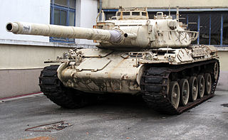 The AMX-30 is a main battle tank designed by Ateliers de construction d'Issy-les-Moulineaux and first delivered to the French Army in August 1965. The first five tanks were issued to the 501st Régiment de Chars de Combat in August of that year. The production version of the AMX-30B weighed 36 metric tons, and sacrificed protection for increased mobility. The French believed that it would have required too much armour to protect against the latest anti-tank threats, thereby reducing the tank's maneuverability. Protection, instead, was provided by the speed and the compact dimensions of the vehicle, including a height of 2.28 metres. It had a 105 mm gun, firing a then advanced high explosive anti-tank warhead known as the Obus G. The Obus G used an outer shell, separated from the main charge by ball bearings, to allow the round to be spin stabilized by the gun without affecting the warhead inside. Mobility was provided by the 720 horsepower (540 kW) HS-110 diesel engine, although the troublesome transmission adversely affected the tank's performance.